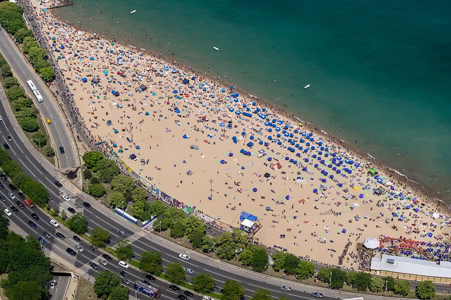 A very crowded Oak Street Beach, as seen from above